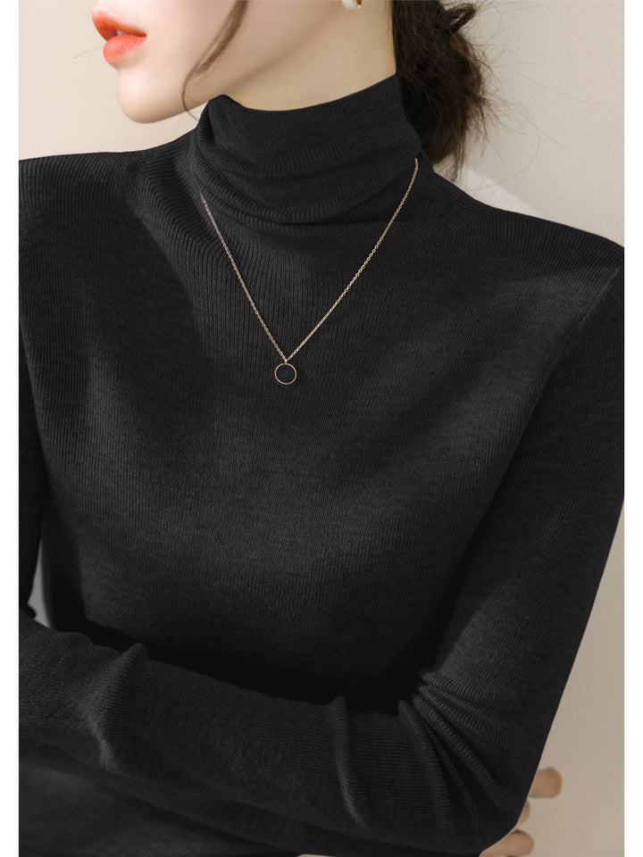 Women's knitted sweater, fitted, with stand-up collar
