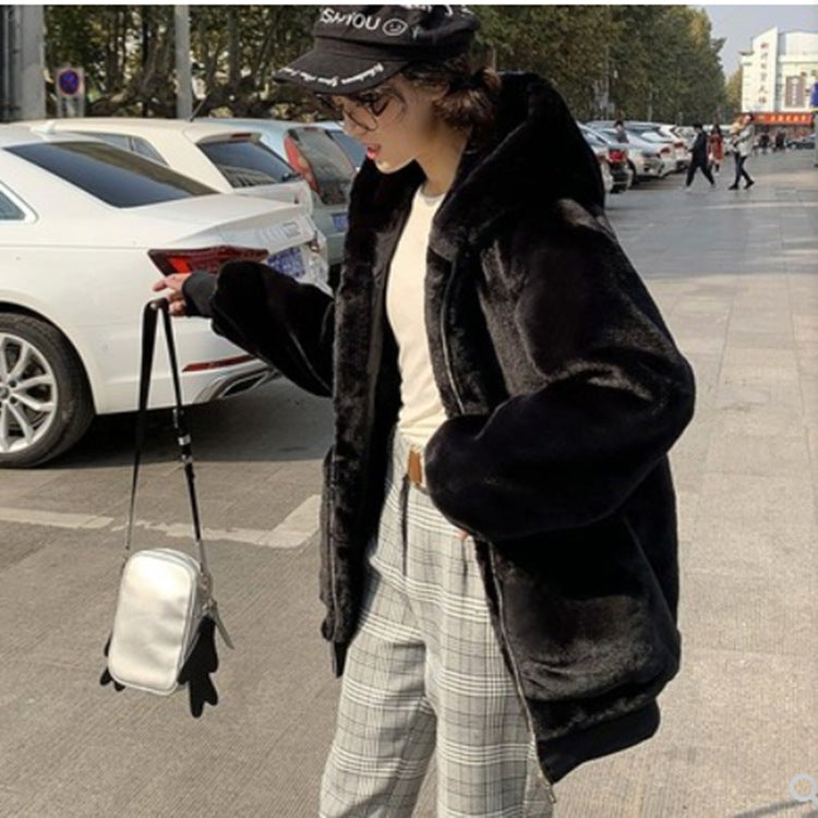 Long women's faux fur coat with hood