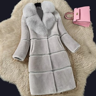 Women's coat made of sheared lambskin with faux fur collar