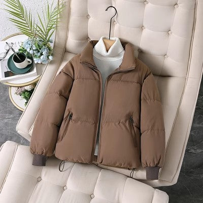 Short women's winter jacket with ribbed cuffs