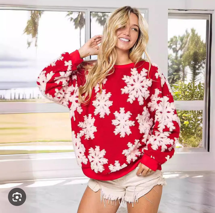 Women’s knitted sweater with floral embroidery