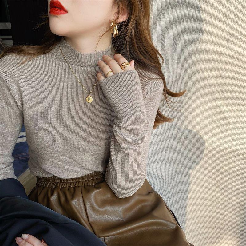 Women's knitted pullover with stand-up collar, slim fit