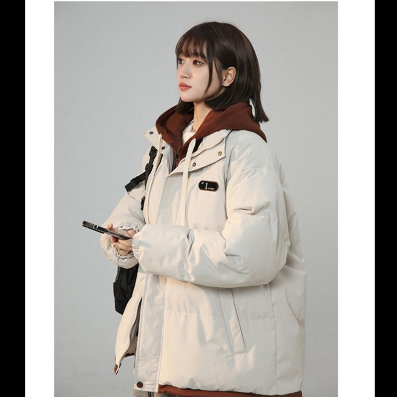 Padded women's winter jacket in layered look