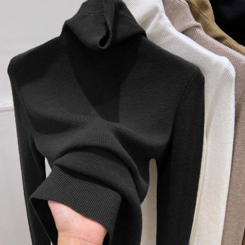 Slimming women’s knitted sweater with stand-up collar