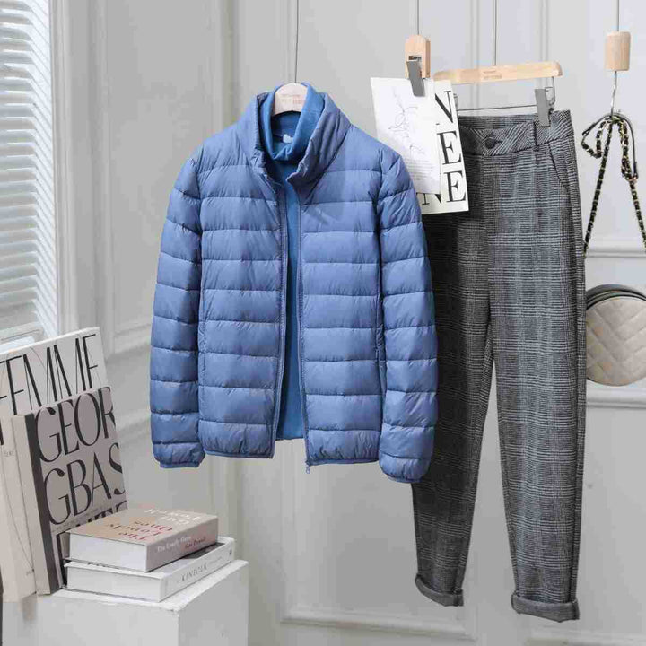 Light women's down jacket with stand-up collar, white duck down