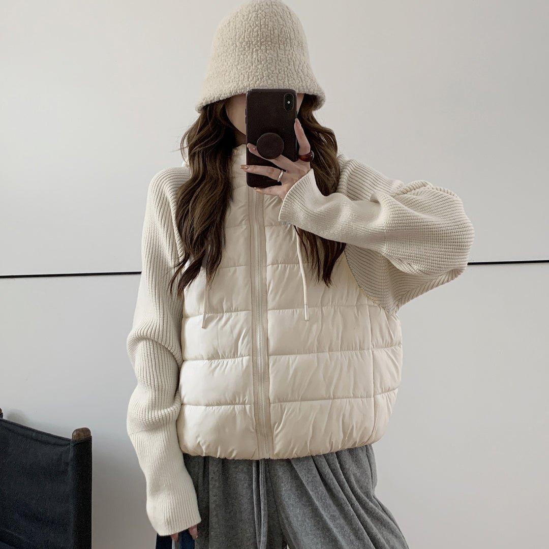 Short ladies' padded jacket with knitted sleeves and hood