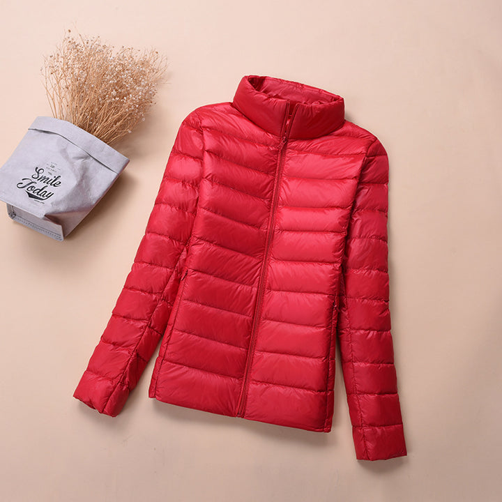 Light women's down jacket, short, with white duck down
