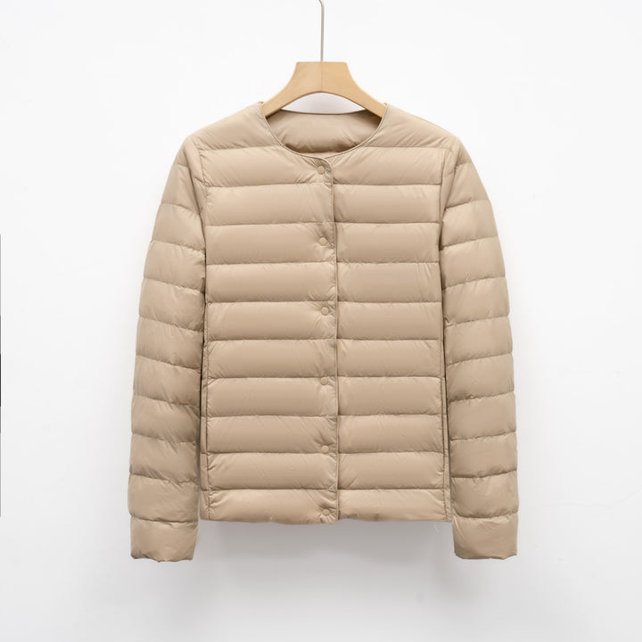 Light women's quilted jacket with round neckline