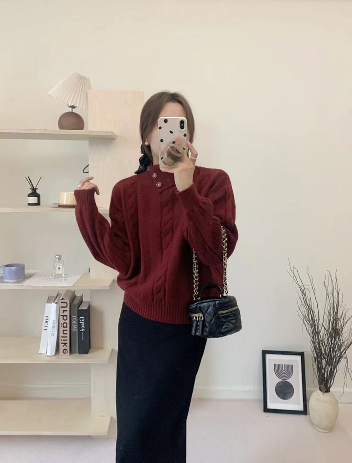 Short cable knit sweater with asymmetric neckline