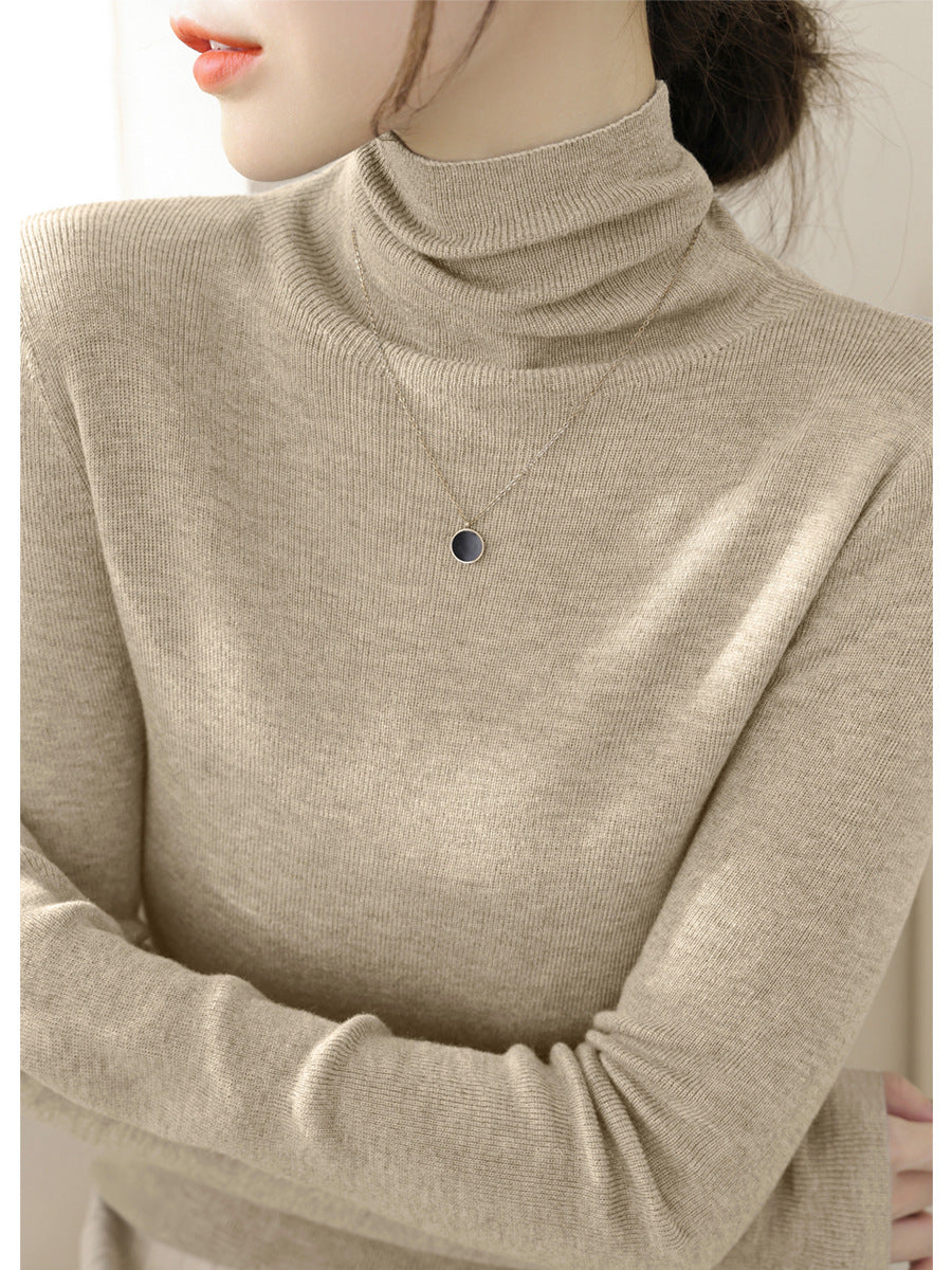 Women's knitted sweater, fitted, with stand-up collar
