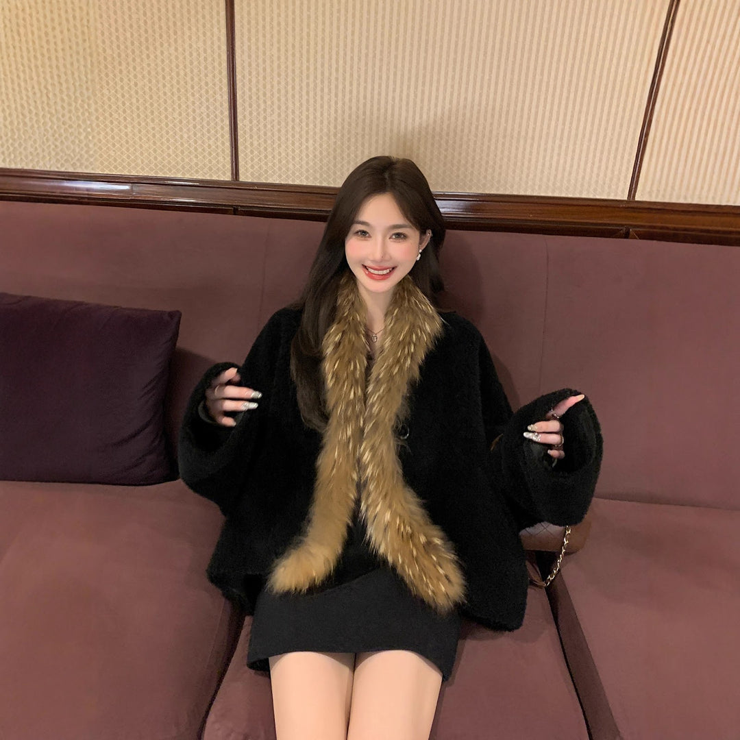 Lamb fleece coat with raccoon fur collar