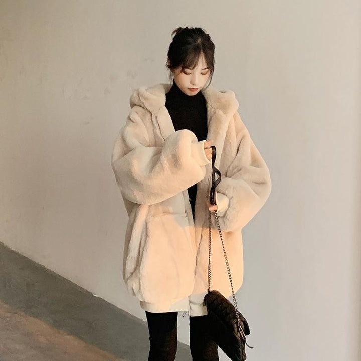 Loosely cut women's faux fur jacket with hood