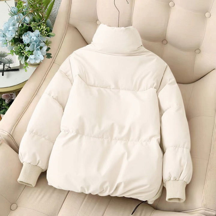 Short women's winter jacket with ribbed cuffs