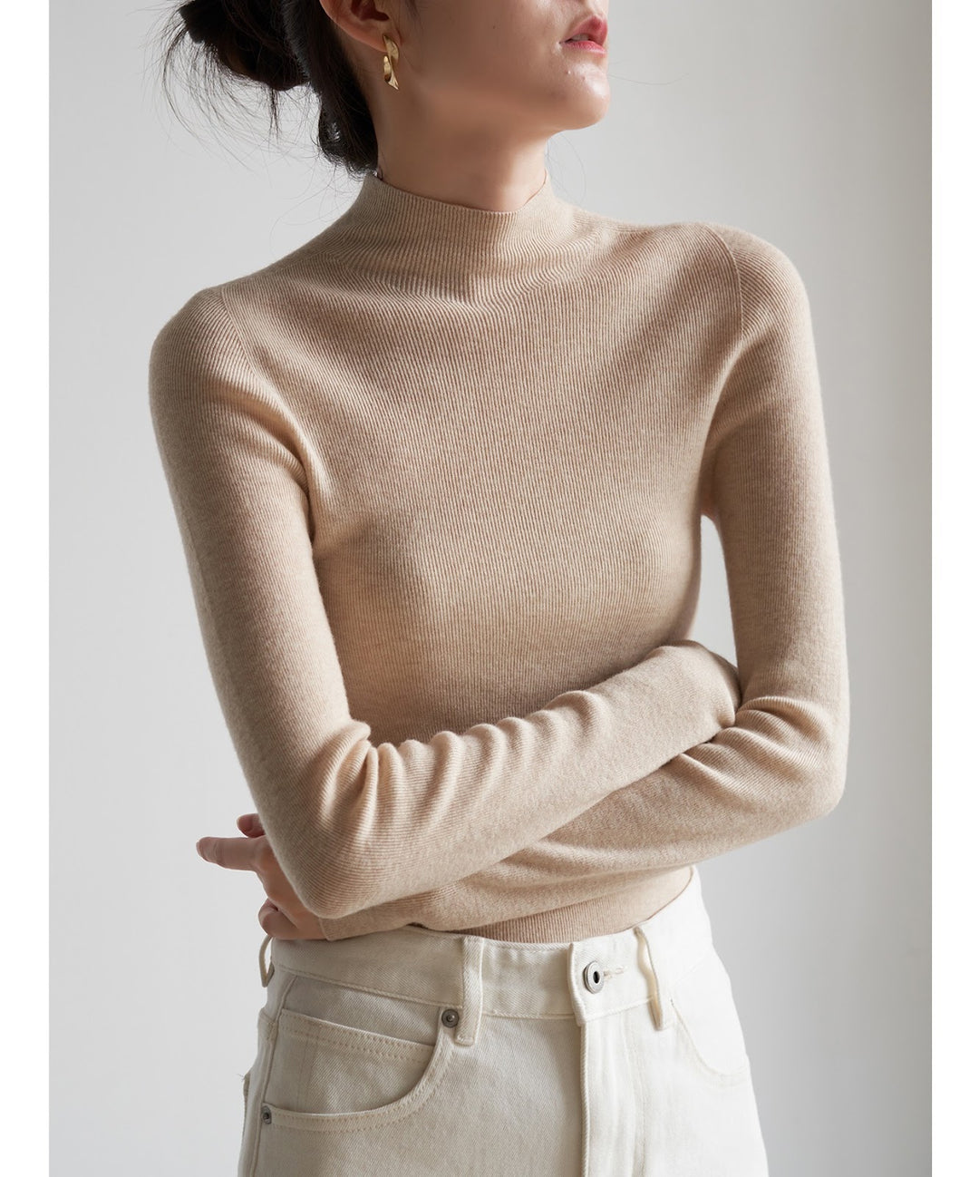 Women's wool knit sweater with stand-up collar
