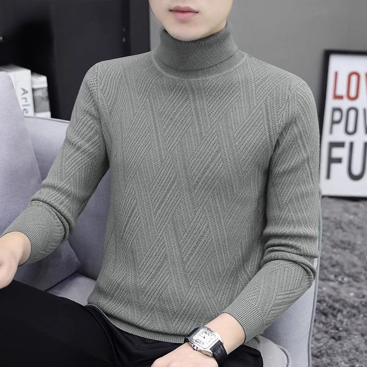 Men's knit pullover with cable pattern and turtleneck
