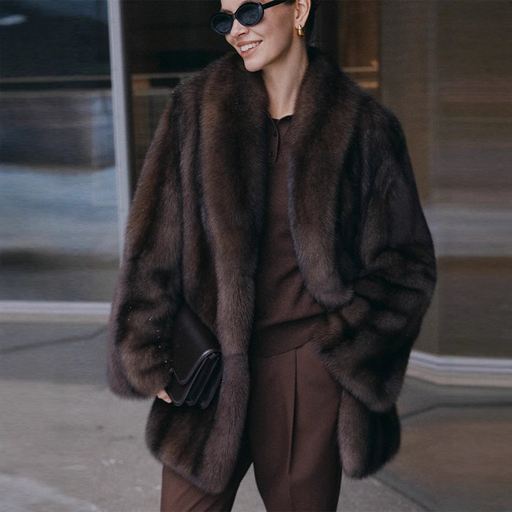 Loose women's faux fur coat in brown