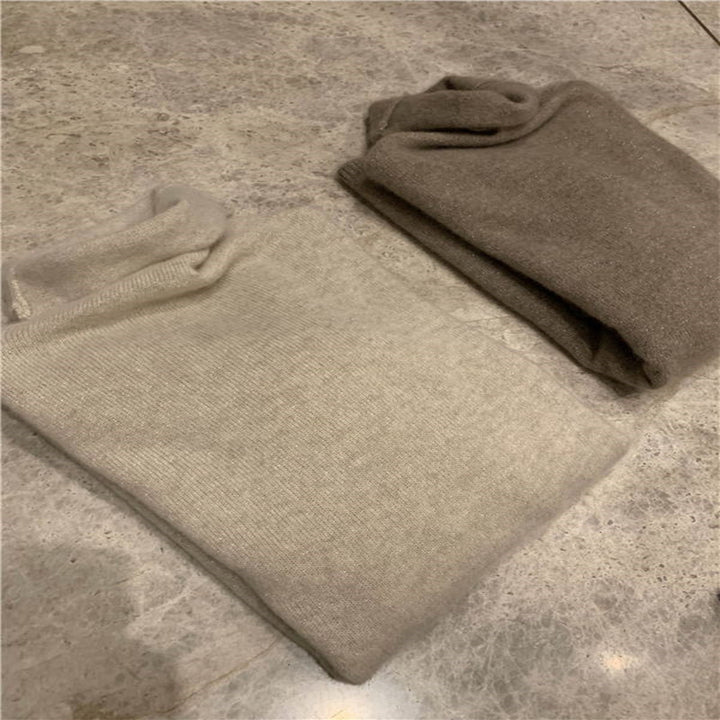 Women's wool pullover with stand-up collar and shine effect