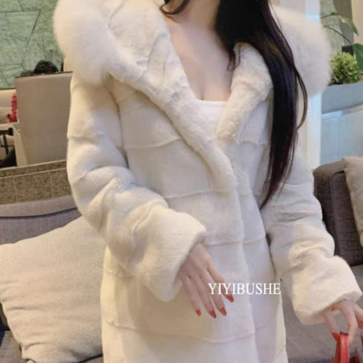 Long women's faux fur coat with hood and fur collar