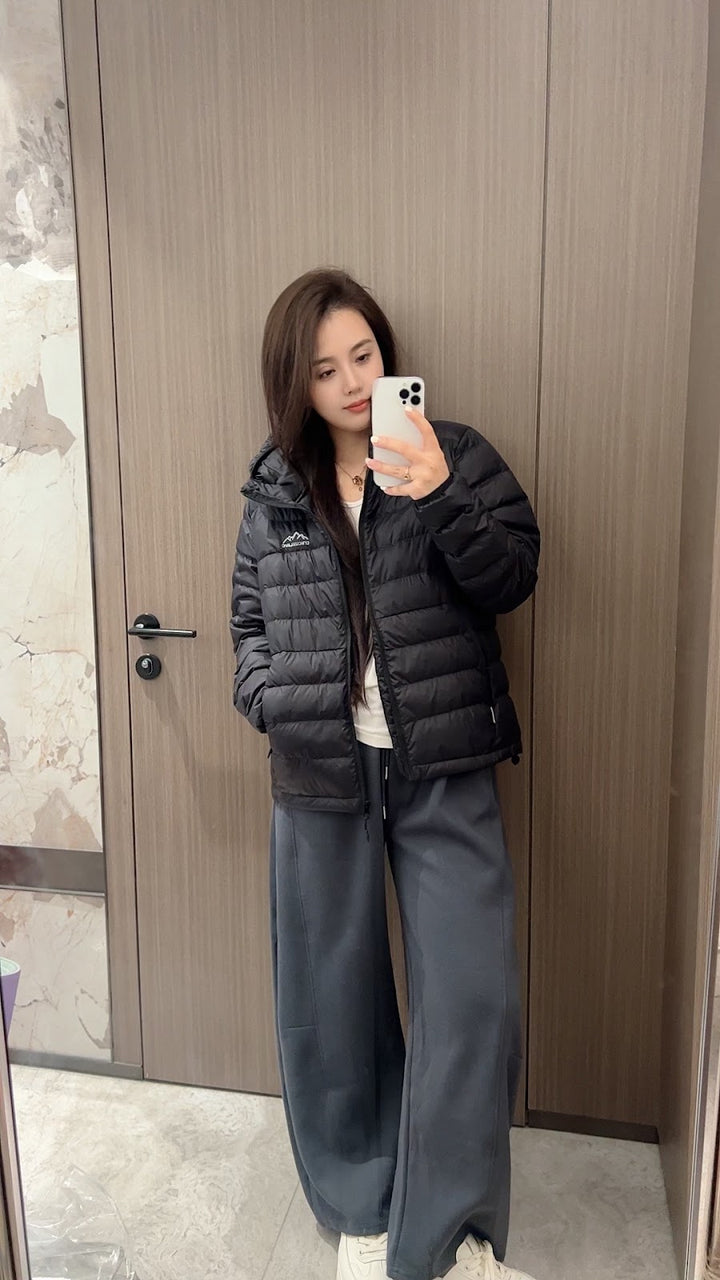 Short women's down jacket with hood