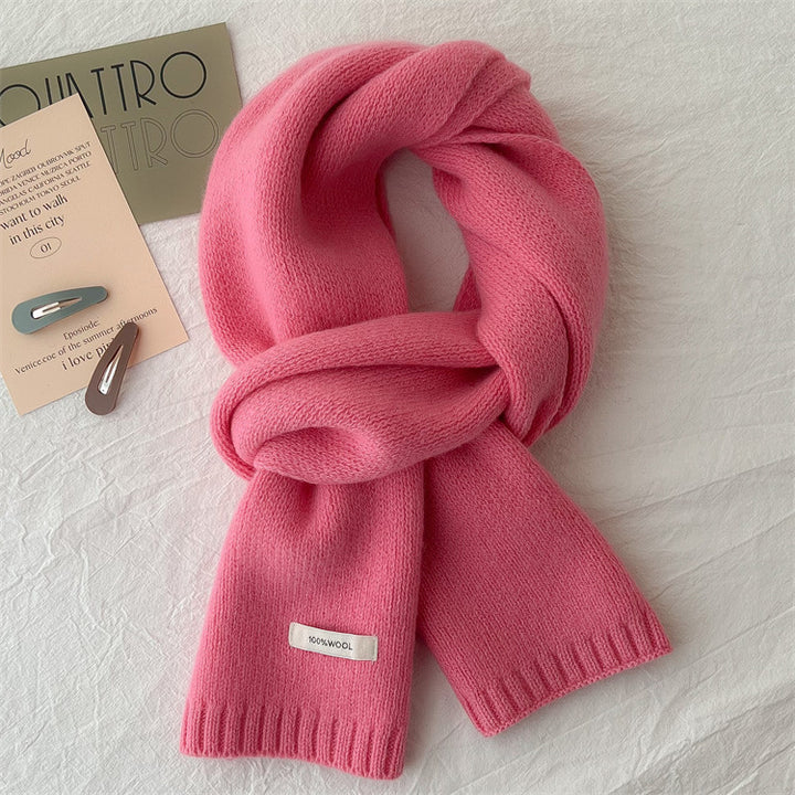 Simple knitted scarf made of pure wool