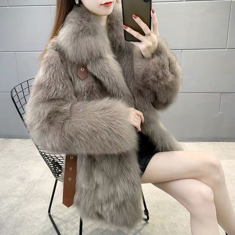 Elegant faux fur coat in fox look