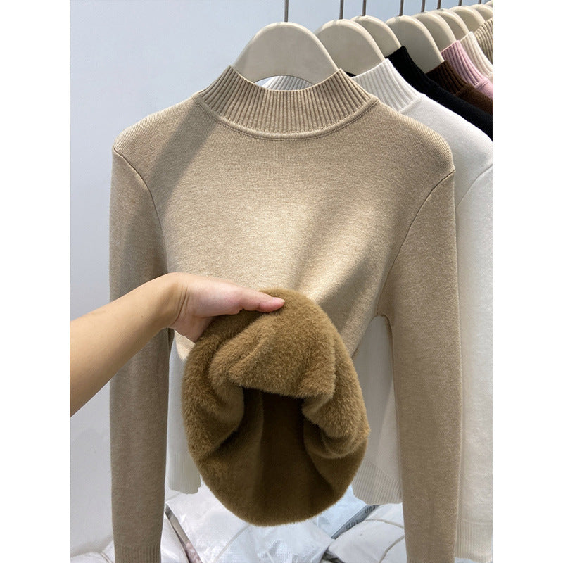 Padded women's knit sweater with high collar
