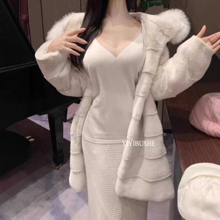 Long women's faux fur coat with hood and fur collar