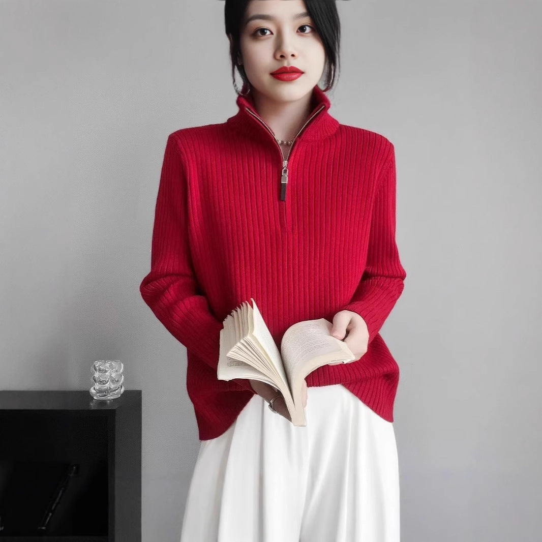Women's knit sweater with zipper and finger holes