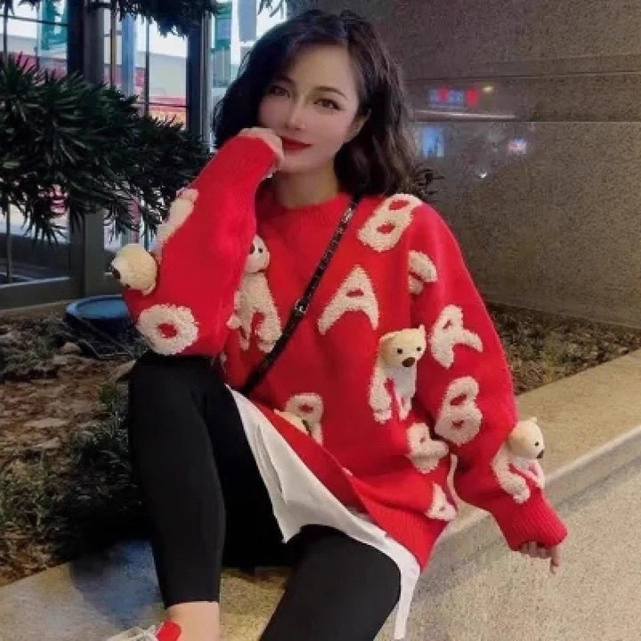 Soft knit sweater with removable bear motif
