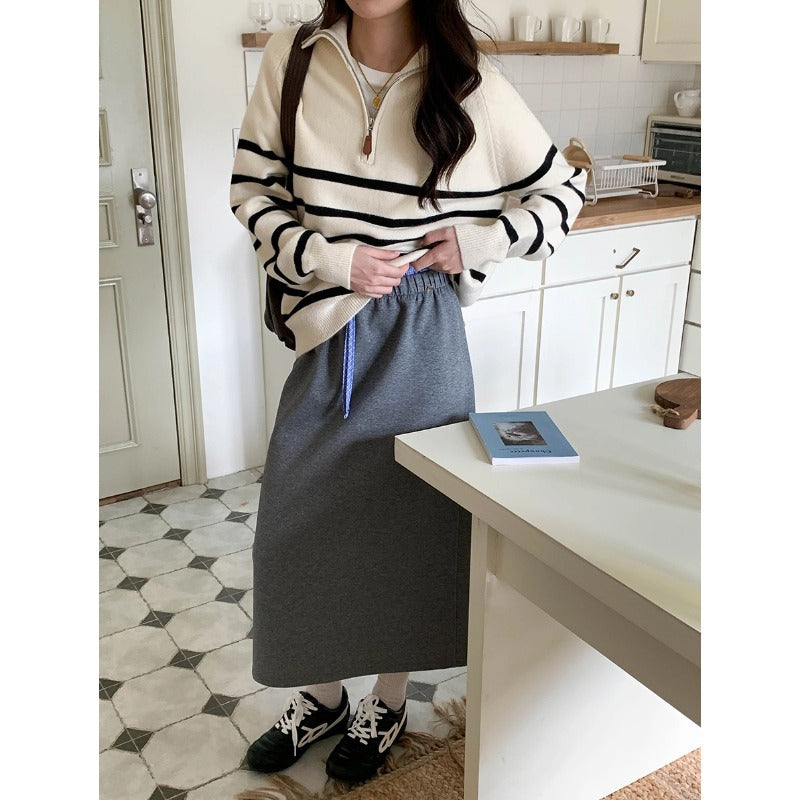 Women's sweater with zipper and stripe pattern