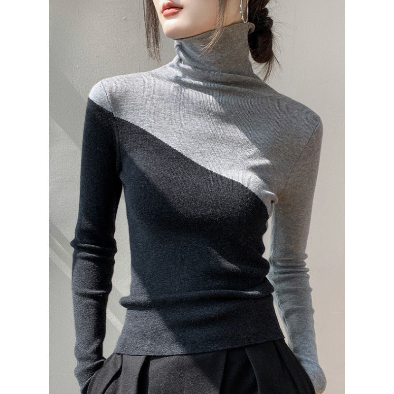 Narrow knit sweater with stand-up collar and color accents