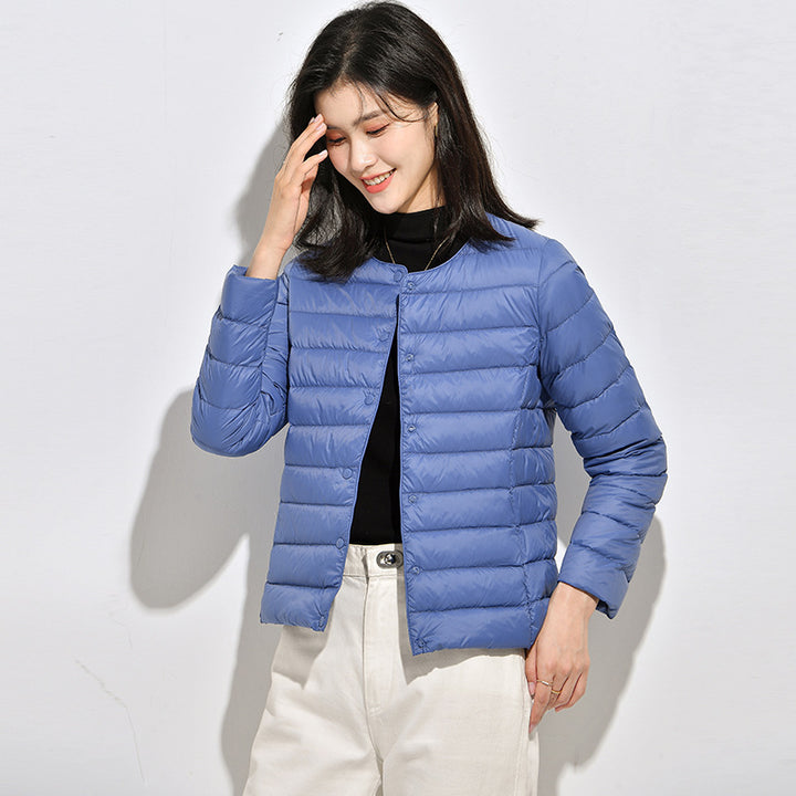 Light women's down jacket, short, as a base layer jacket