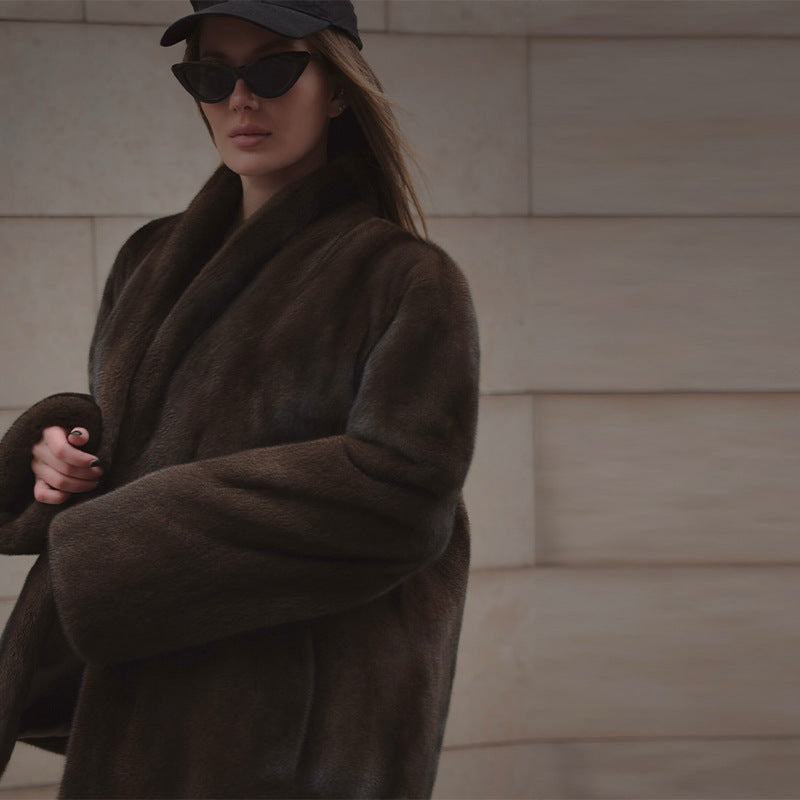 Loose women's faux fur coat in brown