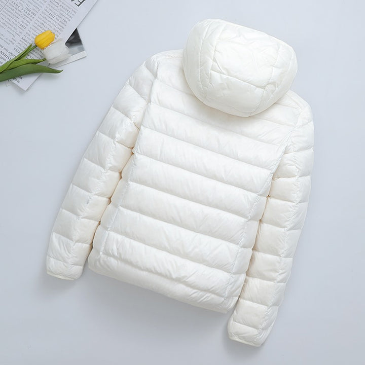 Light women's quilted jacket, short, with hood