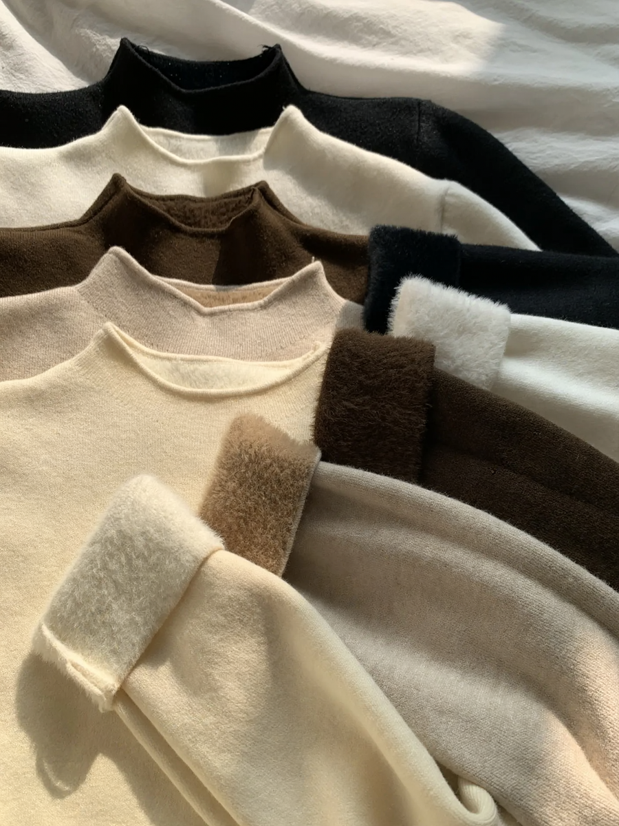 Ladies knitted pullover with stand-up collar, lined
