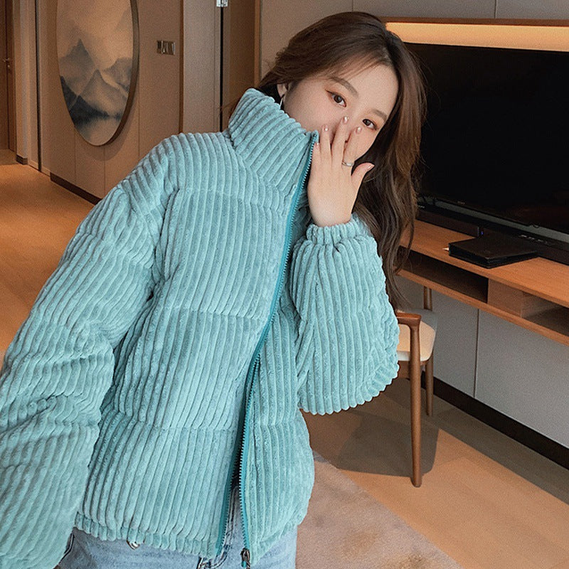 Short women's winter jacket made of corduroy with stand-up collar