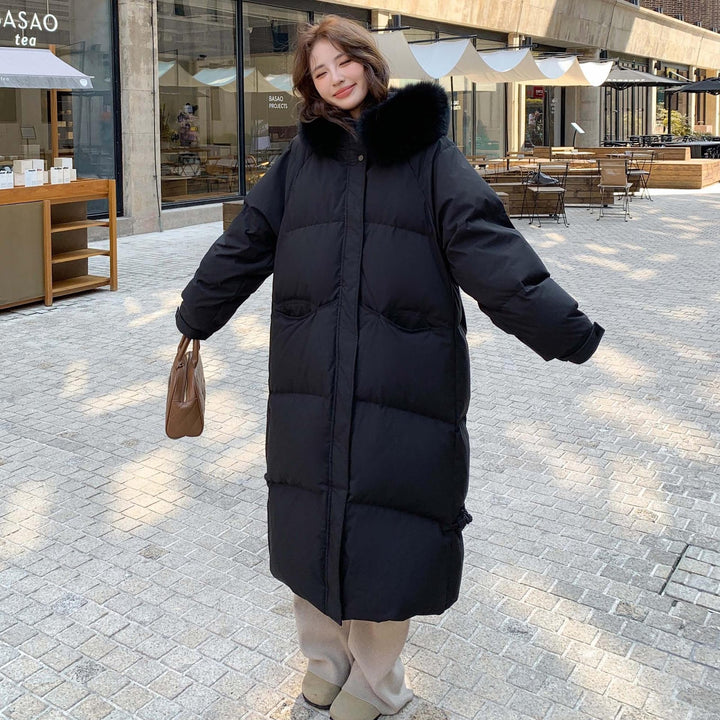Long women's down jacket in plus size with fur collar