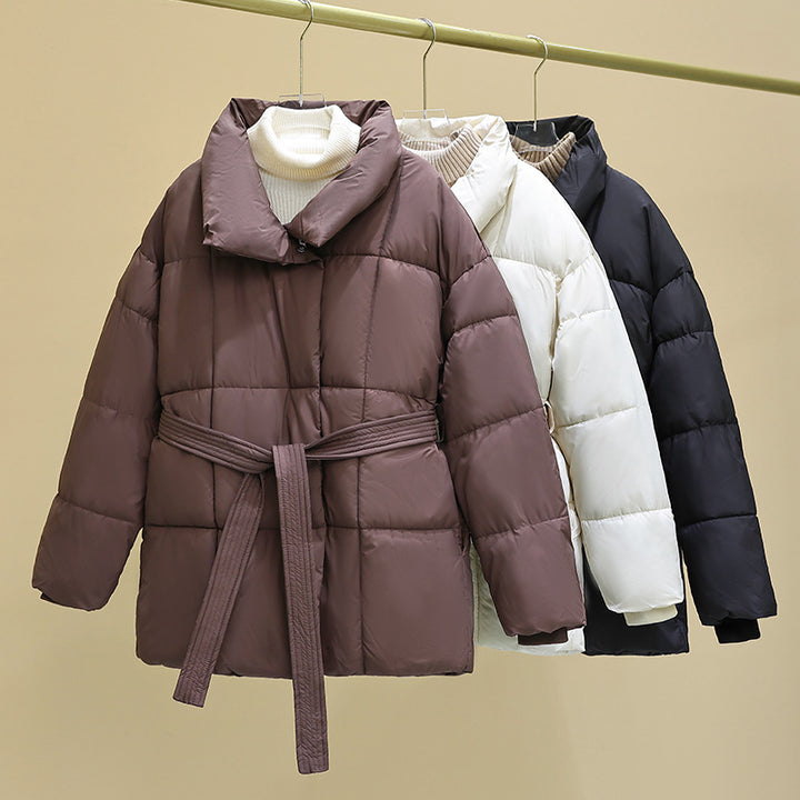 Mid-length women's winter jacket with waist belt