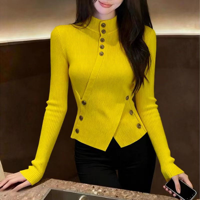 Women's knitted sweater with stand-up collar and asymmetrical cut