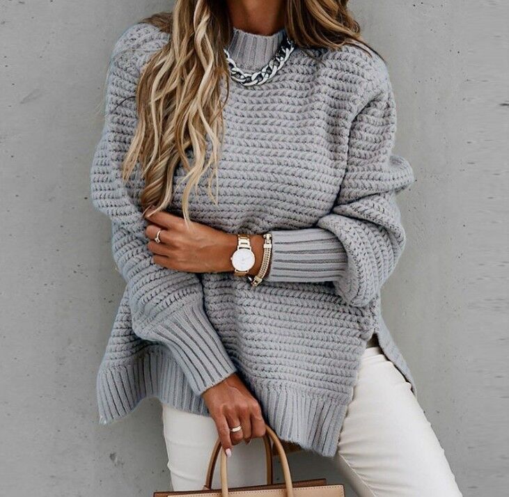 Loose women's knit sweater with cable pattern