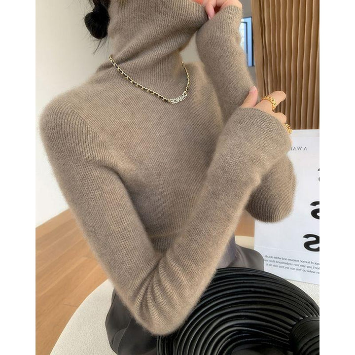Elegant women's turtleneck sweater, slim fit