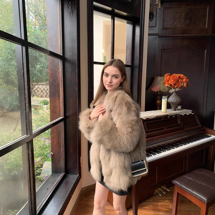 Ladies' medium-length faux fur coat