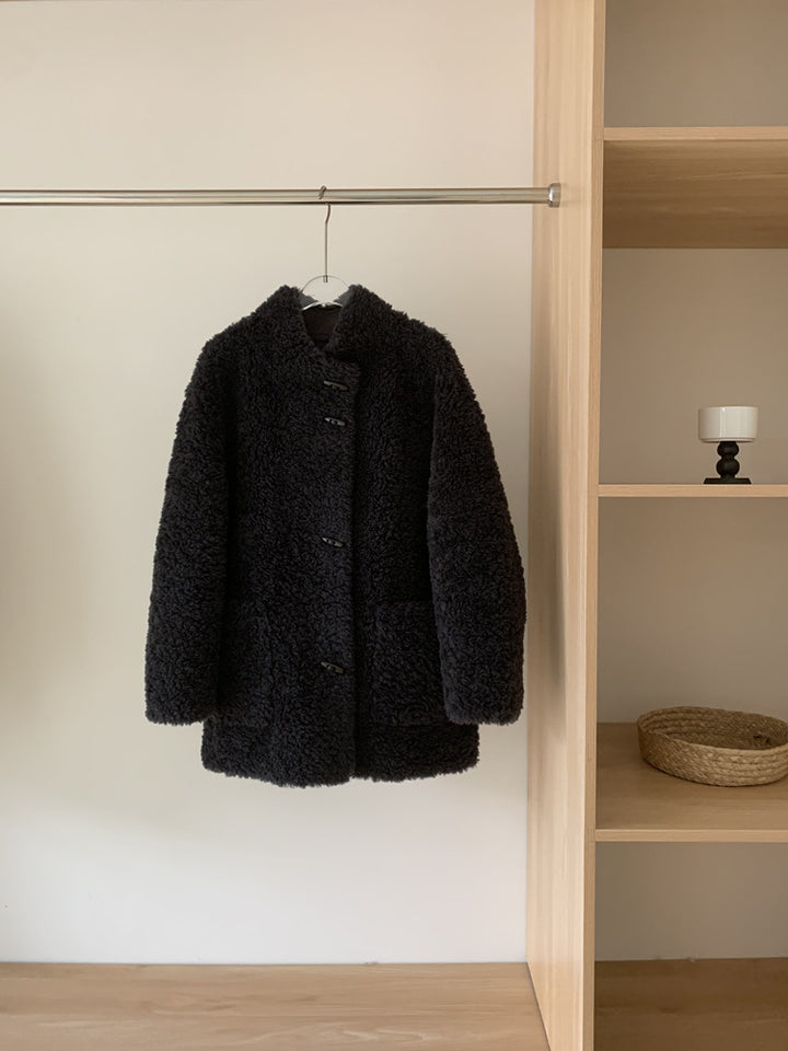 Sheepskin coat with toggle buttons, mid-length