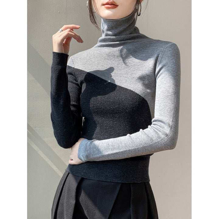 Narrow knit sweater with stand-up collar and color accents