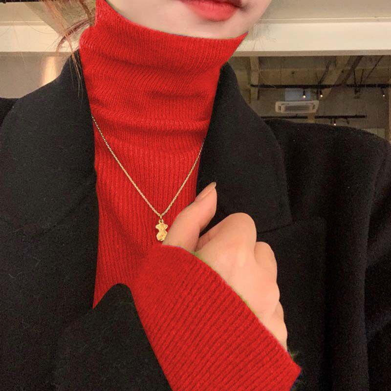 Slimming women’s knitted sweater with stand-up collar