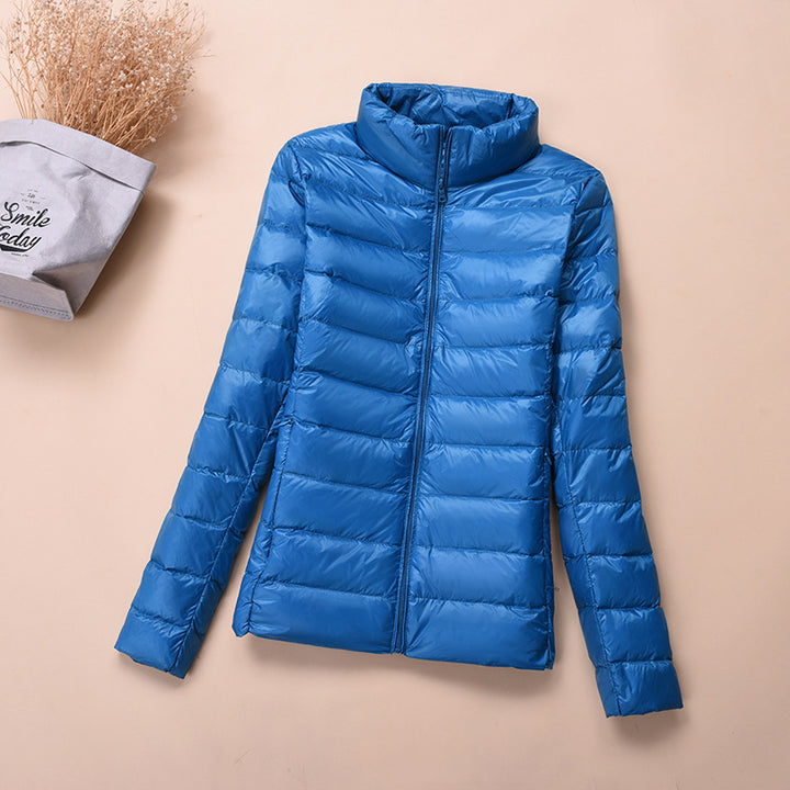 Light women's down jacket, short, with white duck down