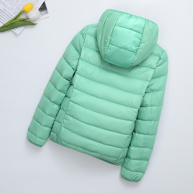 Light women's quilted jacket, short, with hood
