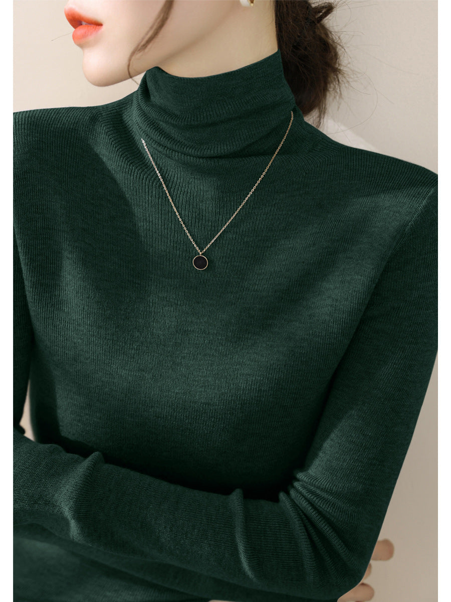 Women's knitted sweater, fitted, with stand-up collar