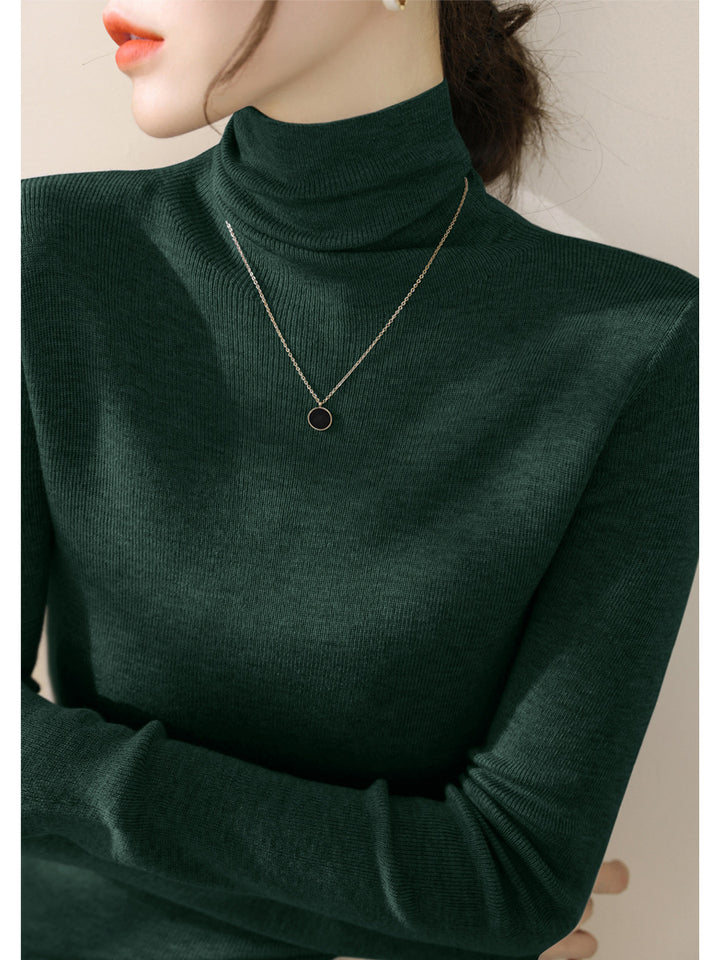 Women's knitted sweater, fitted, with stand-up collar