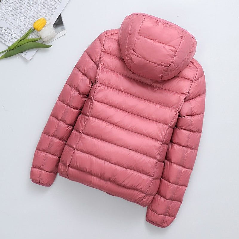 Light women's quilted jacket, short, with hood